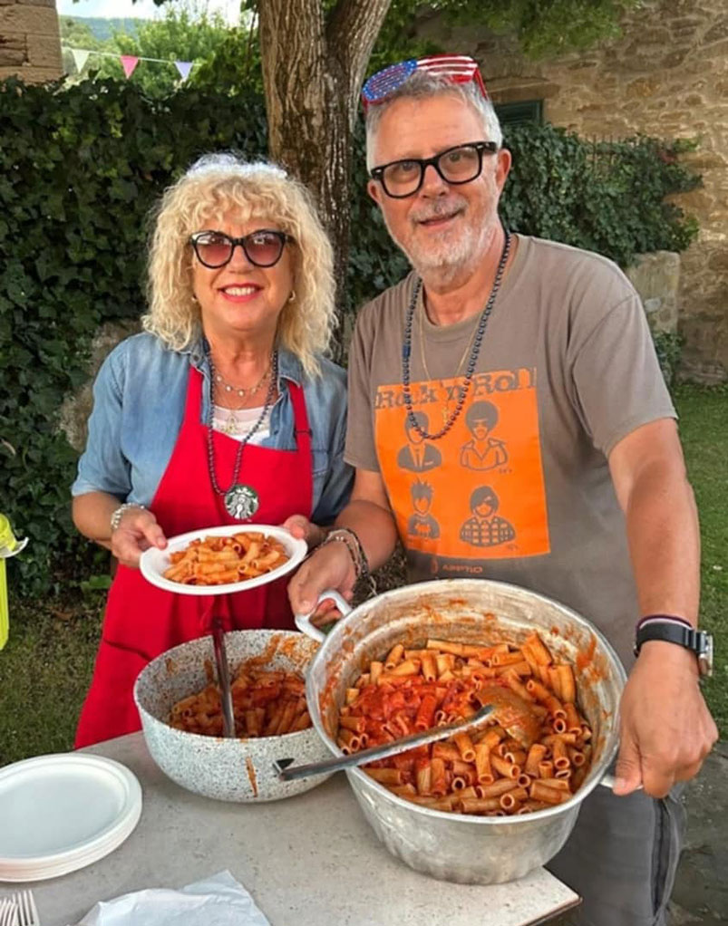 Rosy and Amedeo help prepare the Italian Feast (yummy pasta) for the 4th of July Celebration and Birthday Celebration for Amedeo, Larry J Snyder.